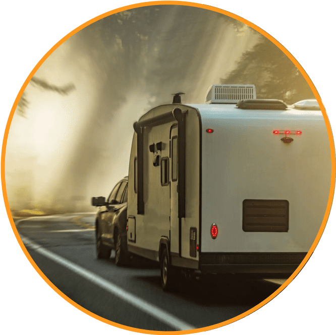 Car-towing-caravan-with-moody-sunlight-in-trees-MitchMarket-Finance