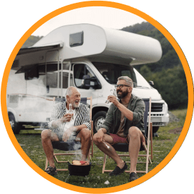 Two-men-sitting-on-camping-chairs-drinking-beer-and-talking-in-front-of-RV-MitchMarket-Finance