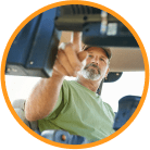 man in tractor pushing a button